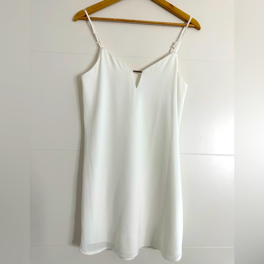 This loose fitted summer dress has adjustable spaghetti straps